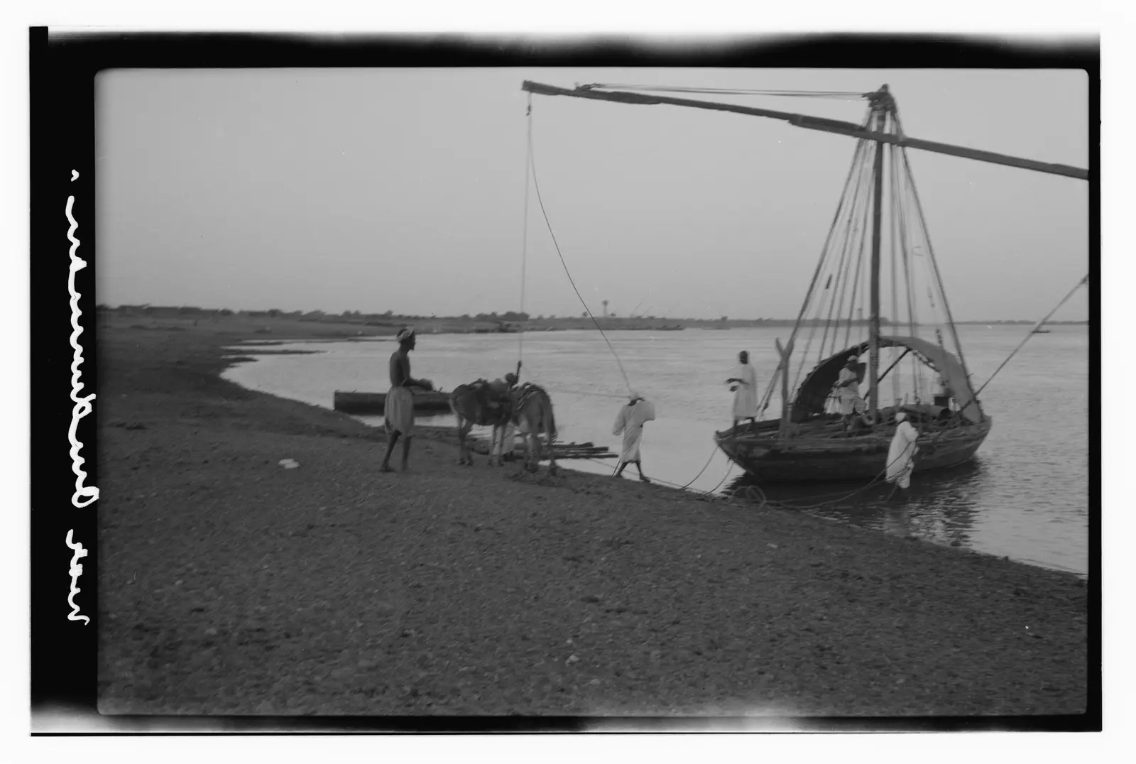 Near Omdurman, loading boats on the Nile (1936)